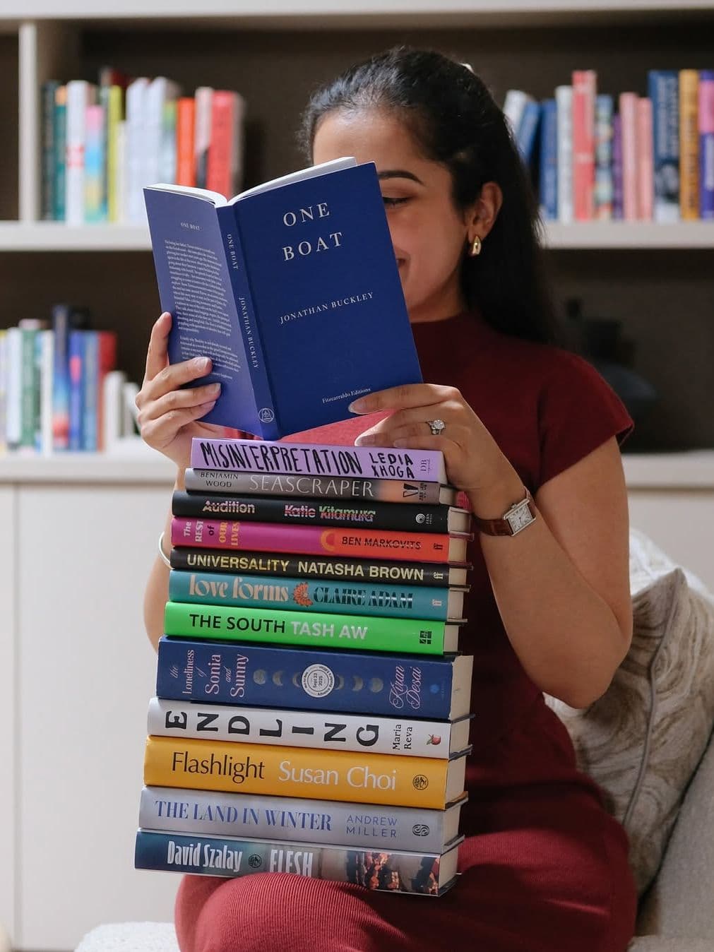 A curated stack of books